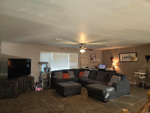 carpeted living room featuring ceiling fan