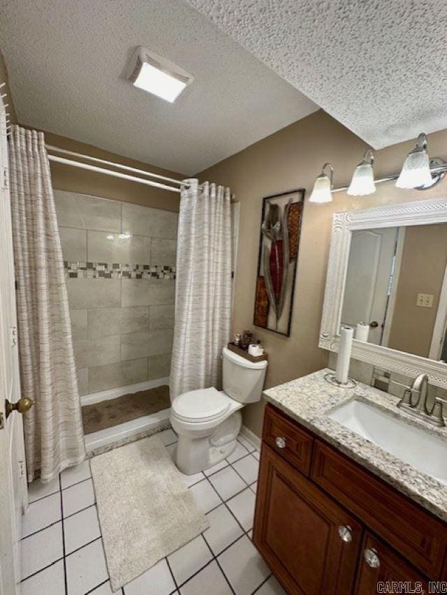 bathroom with tile patterned flooring, vanity, toilet, and a shower with curtain