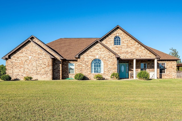 view of front of property with a front lawn