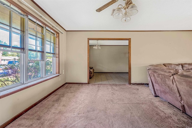 interior space featuring ceiling fan and ornamental molding