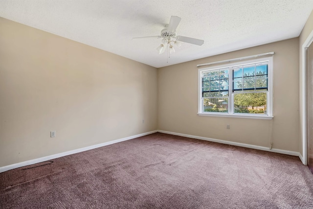 unfurnished room with a textured ceiling, carpet floors, and ceiling fan