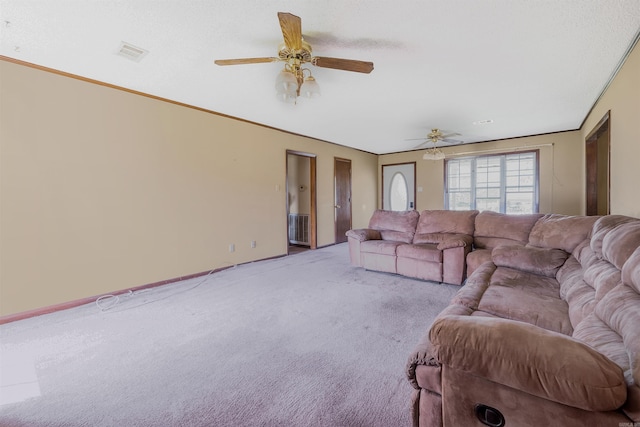 carpeted living room with ceiling fan