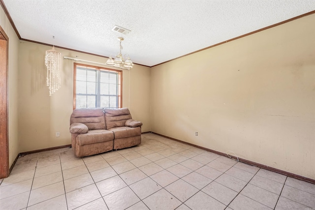 unfurnished room featuring an inviting chandelier, a textured ceiling, crown molding, and light tile patterned floors