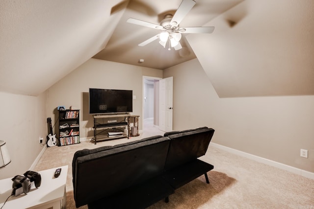 carpeted living room with vaulted ceiling and ceiling fan