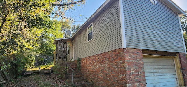 view of property exterior featuring a garage