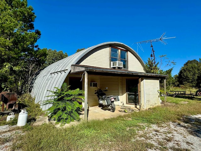 rear view of property with a patio