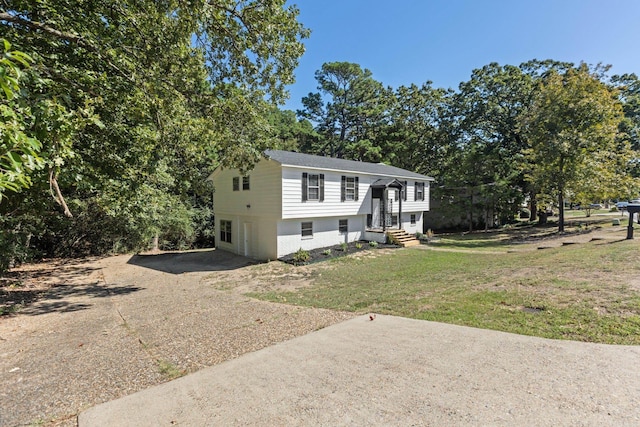 bi-level home featuring a front yard