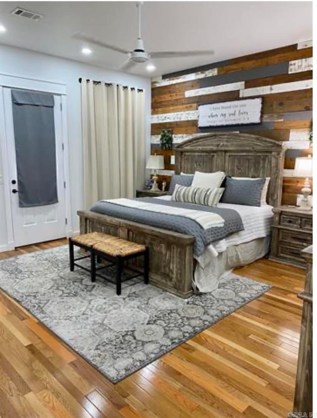 bedroom featuring ceiling fan and light wood-type flooring