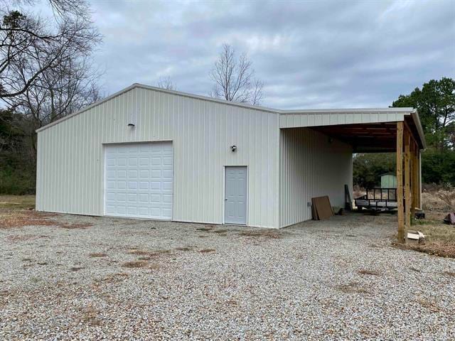 view of outbuilding with a garage