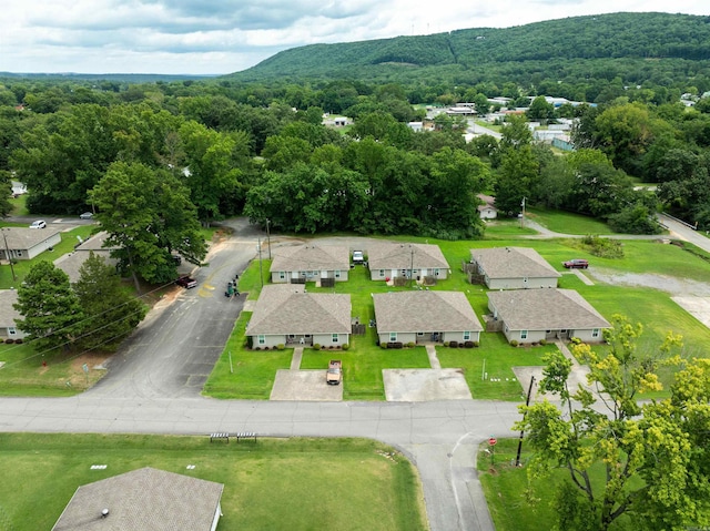 birds eye view of property with a mountain view