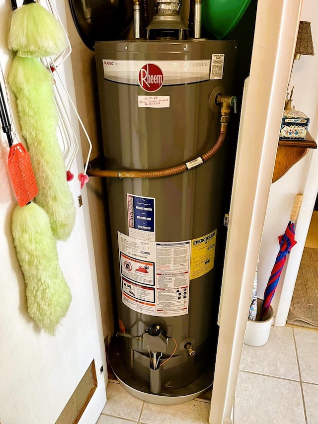 utility room with water heater