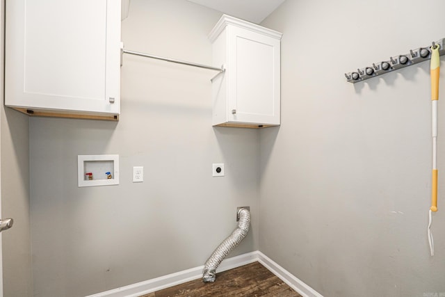 laundry room with hookup for a washing machine, hookup for an electric dryer, dark wood-type flooring, and cabinets