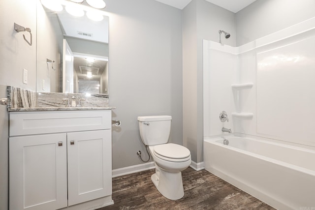 full bathroom with wood-type flooring, vanity, toilet, and shower / washtub combination