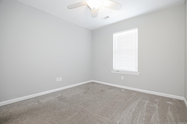 carpeted empty room with ceiling fan