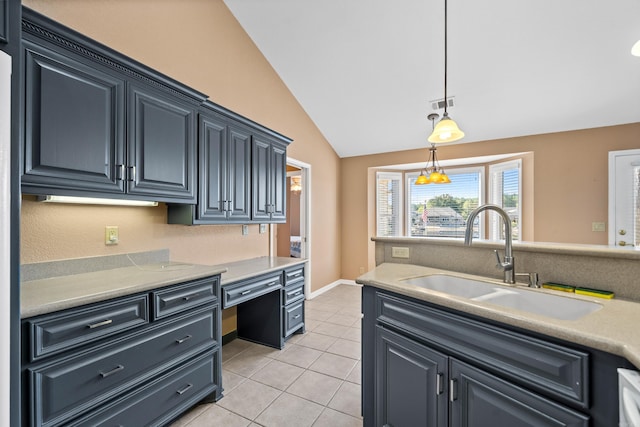 kitchen with lofted ceiling, hanging light fixtures, light tile patterned flooring, and sink