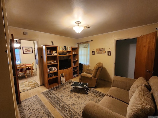 living room featuring crown molding