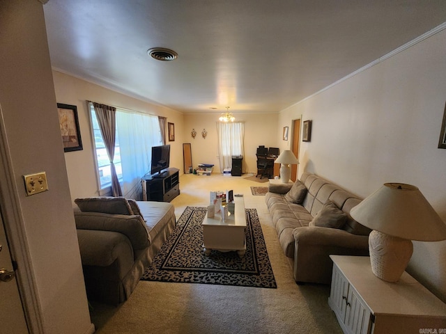 carpeted living room featuring an inviting chandelier and ornamental molding