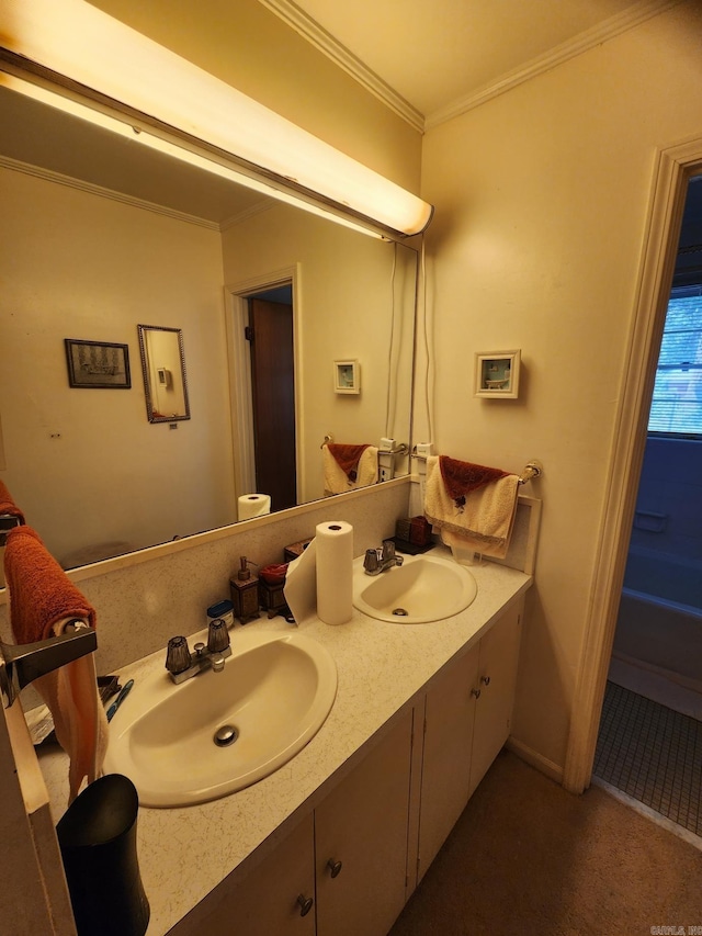 bathroom featuring ornamental molding and vanity