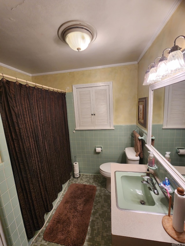 bathroom with tile walls, a shower with curtain, ornamental molding, vanity, and toilet