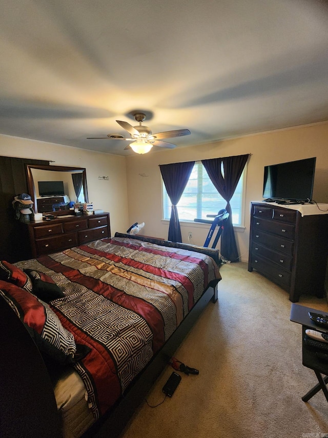 bedroom featuring ceiling fan and light colored carpet