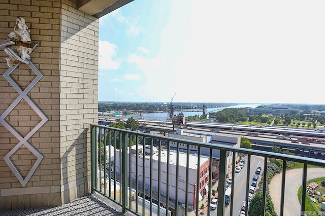 balcony featuring a water view