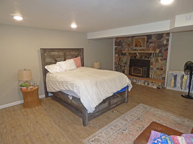 bedroom featuring wood-type flooring