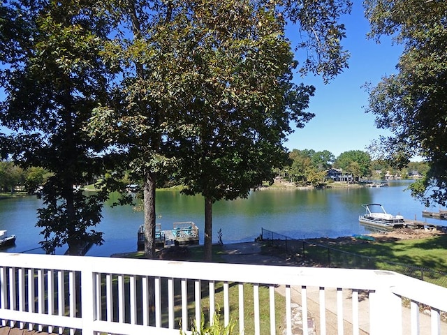 view of water feature with a dock