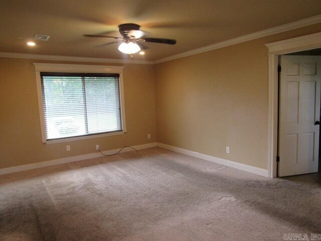 201 W Palm, Lonoke, AR 72086 - carpeted spare room featuring crown molding, baseboards, a ceiling fan, and recessed lighting