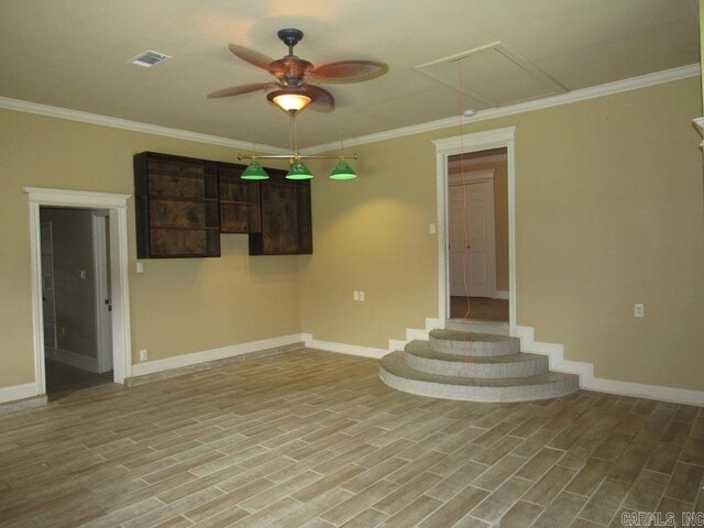 201 W Palm, Lonoke, AR 72086 - interior space featuring a ceiling fan, baseboards, and attic access