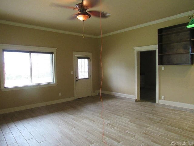 unfurnished room featuring ornamental molding, ceiling fan, and light hardwood / wood-style floors