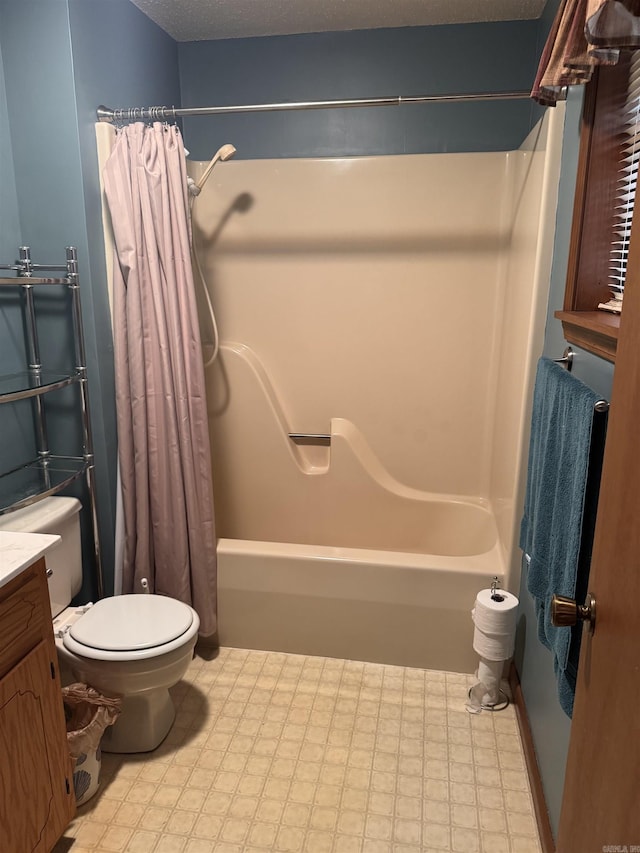 full bathroom featuring a textured ceiling, vanity, shower / tub combo, and toilet