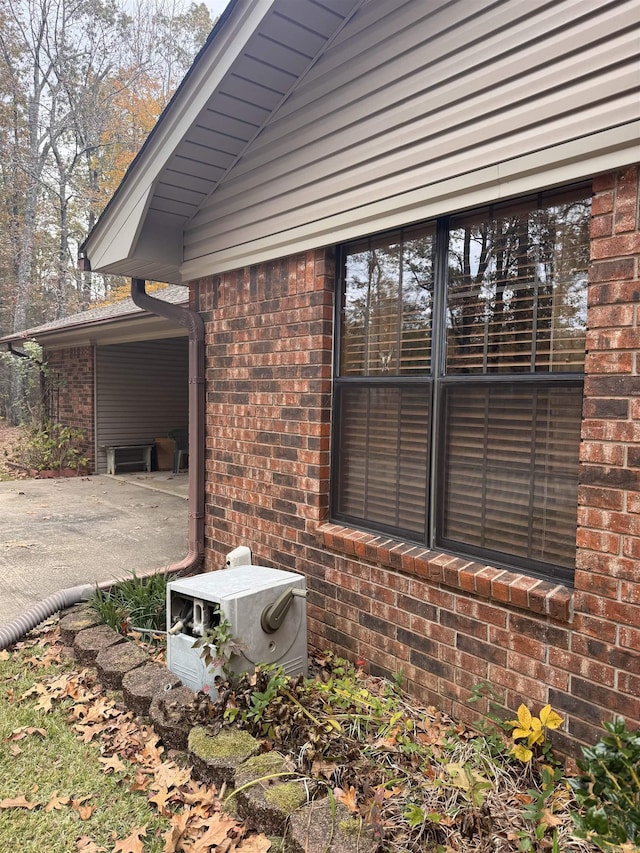 view of property exterior featuring a patio area