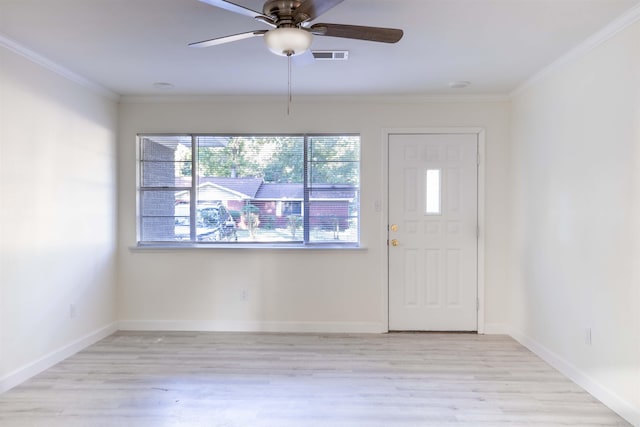 foyer entrance with ceiling fan, light hardwood / wood-style flooring, and crown molding