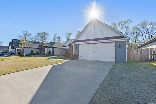 view of front facade featuring a front yard and a garage