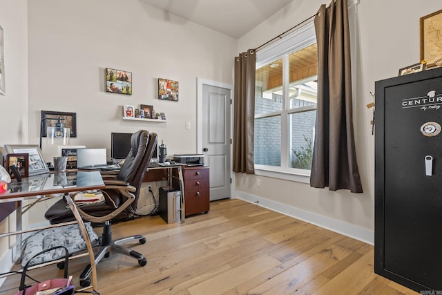 home office featuring light wood-type flooring