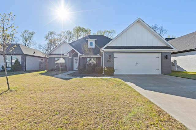 view of front of home with a garage and a front yard