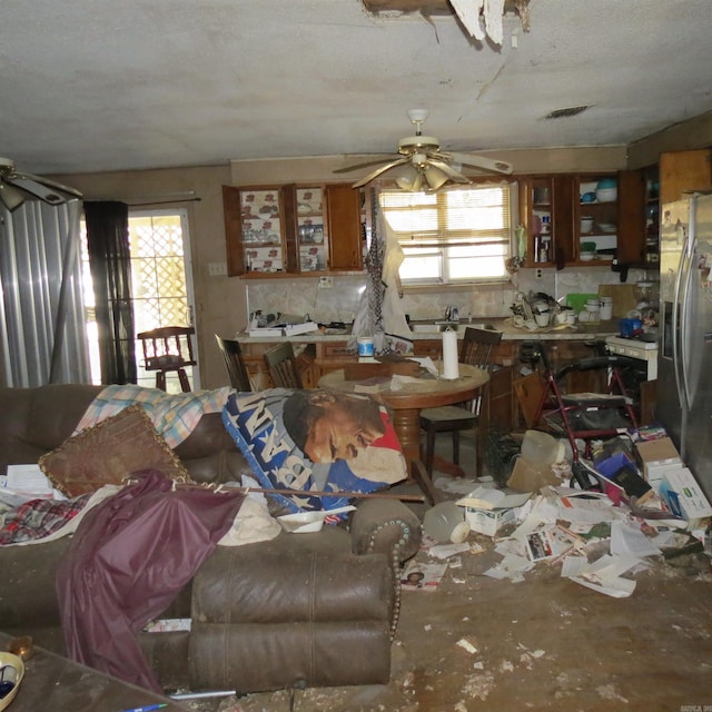 interior space with ceiling fan and a healthy amount of sunlight