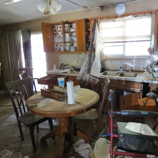 dining room featuring sink and concrete floors