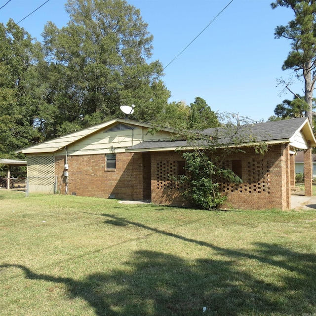 exterior space with a yard