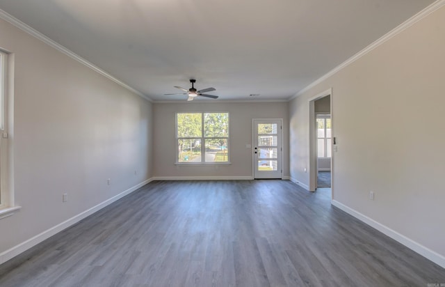 unfurnished room with crown molding, hardwood / wood-style floors, and ceiling fan