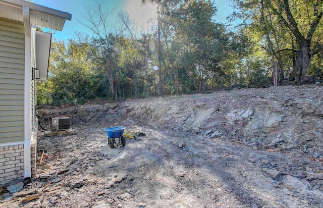 view of yard with central AC