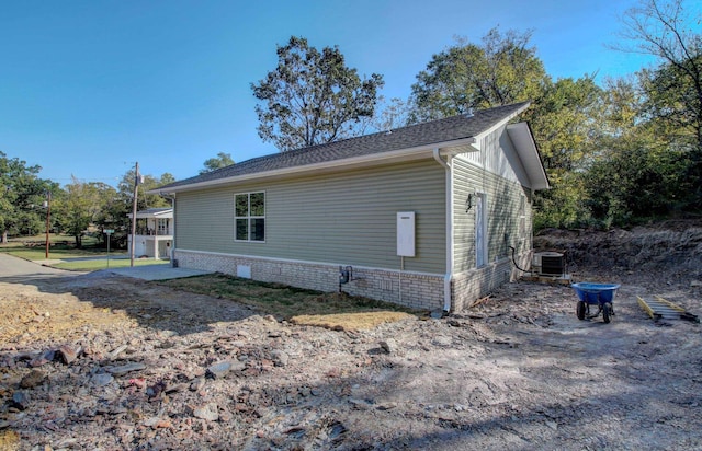 view of home's exterior featuring central AC and a patio area