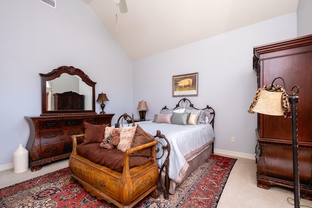 carpeted bedroom featuring vaulted ceiling and ceiling fan