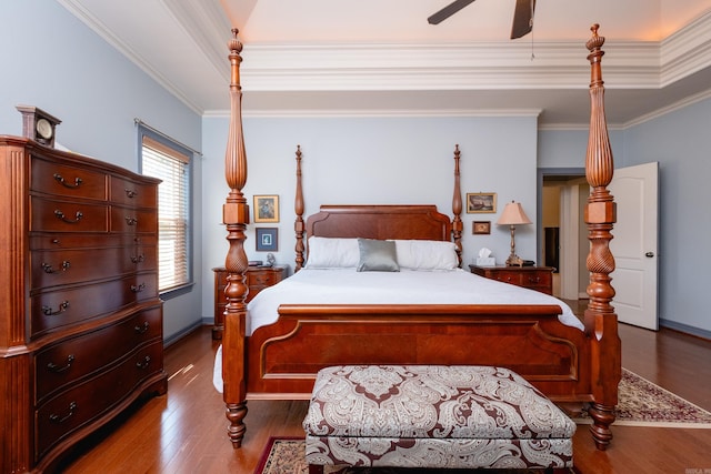 bedroom featuring ceiling fan, ornamental molding, and hardwood / wood-style floors