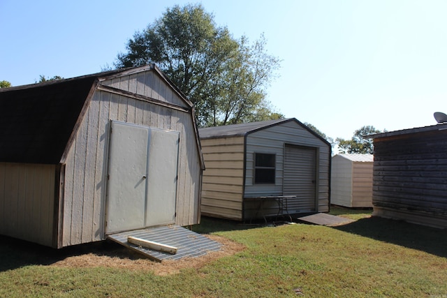 view of outdoor structure with a lawn