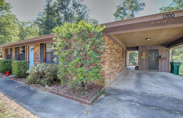 view of front of property with a carport