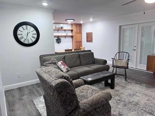 living room with french doors, crown molding, hardwood / wood-style flooring, and ceiling fan