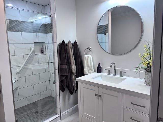 bathroom featuring crown molding, walk in shower, and vanity