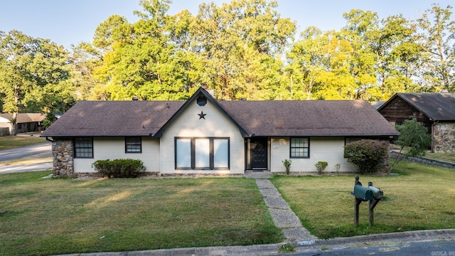 view of front of house with a front yard