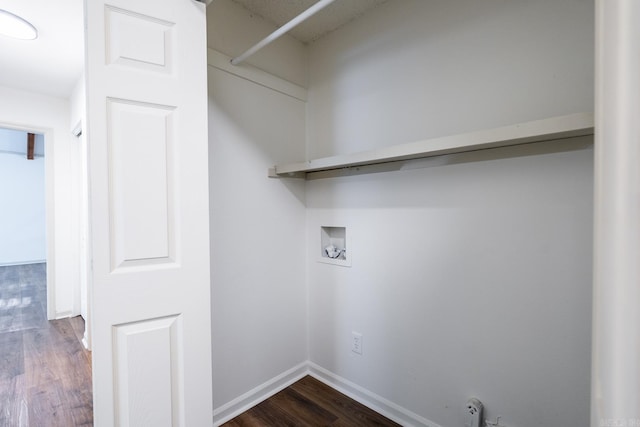 washroom with hookup for a washing machine and dark hardwood / wood-style floors